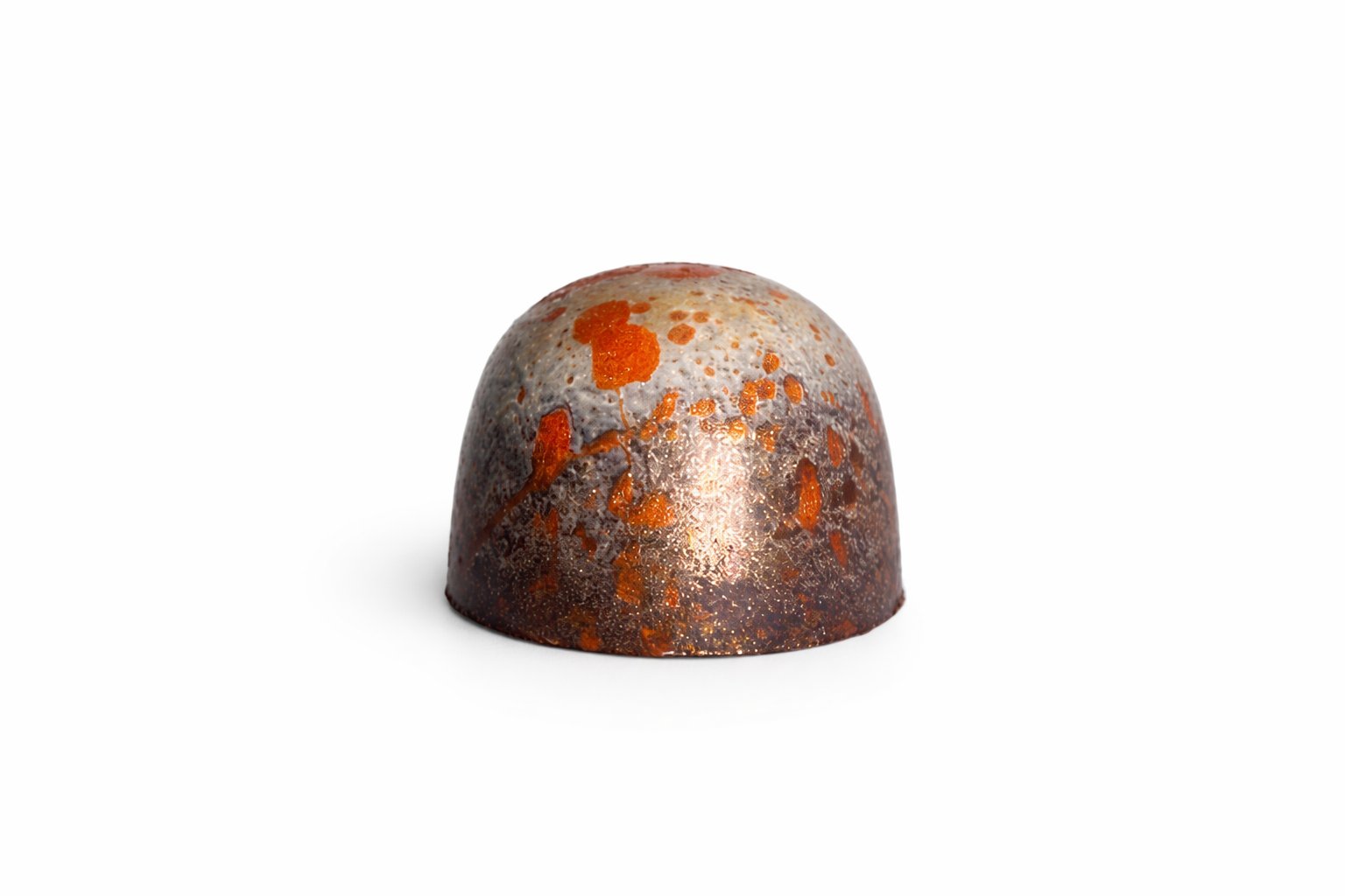 Dark Orange chocolate bonbon with bronze and orange speckled finish