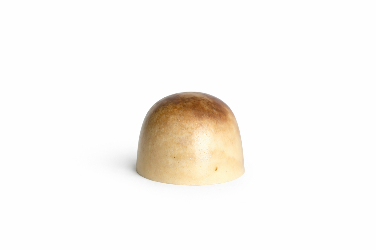 White Cappuccino chocolate bonbon with coffee-toned gradient finish